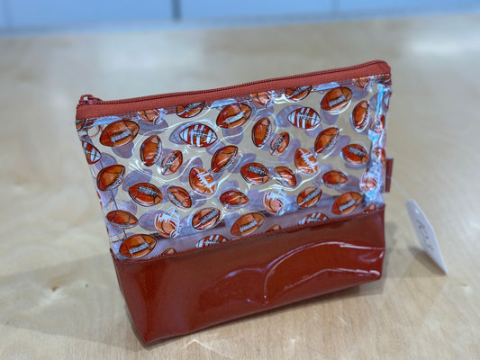 Clear Vinyl Bag #103 - Footballs with Rust Base
